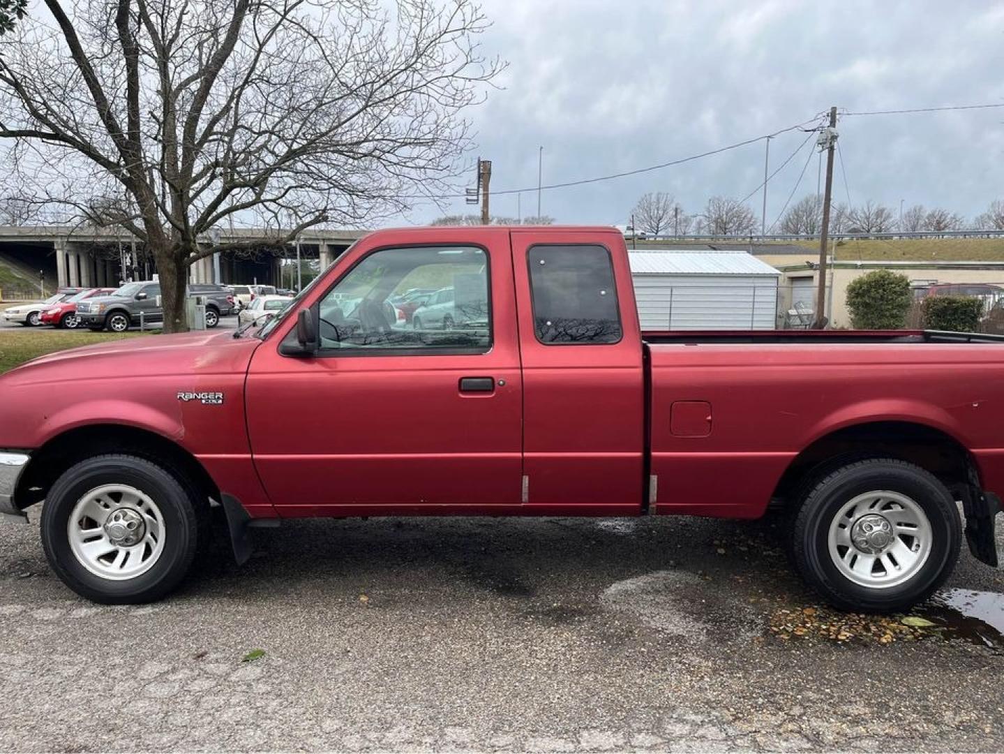 1999 Red /Gray Ford Ranger XL (1FTYR14C9XT) with an 2.5 4 Cylinder engine, 5 Speed Manual transmission, located at 5700 Curlew Drive, Norfolk, VA, 23502, (757) 455-6330, 36.841885, -76.209412 - -1999 Ford Ranger 5 Speed Manual 146k -2.5 4 cylinder extended cab -Runs and drives great -Clearcoat faded on front and hood -New state inspection -Ready for a new owner -VADLR - Photo#2